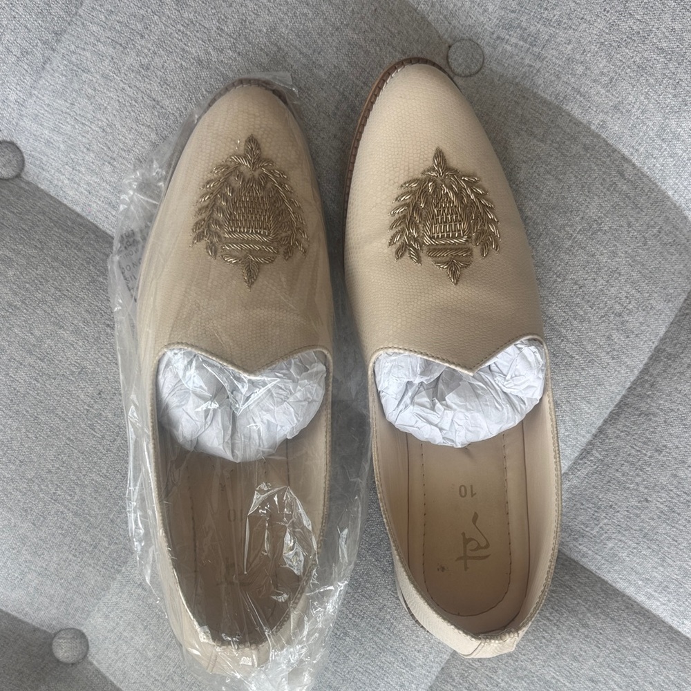 Men's Cream Slip-On Loafers with Embroidered Crest